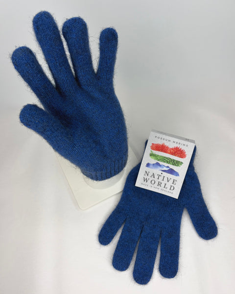 Pair of blue gloves with a Native World tag on a white background