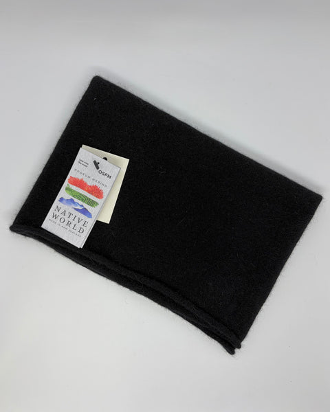 Black neck warmer with a Native World tag on a white background