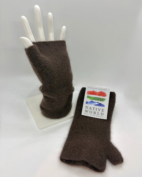 Brown fingerless gloves on a white mannequin hand with a ‘Native World’ label on a white background