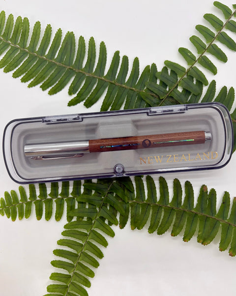 Wooden pen with silver cap and kiwi bird engraving in a plastic box