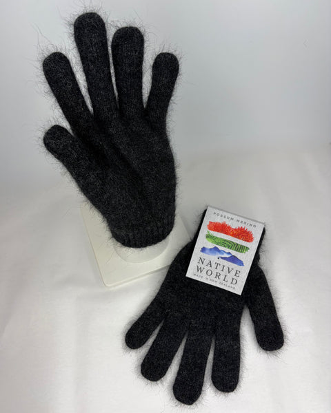 Pair of charcoal grey gloves with a Native World label on a white background