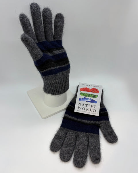 Pair of gray and navy striped gloves with a Native World label on a white background