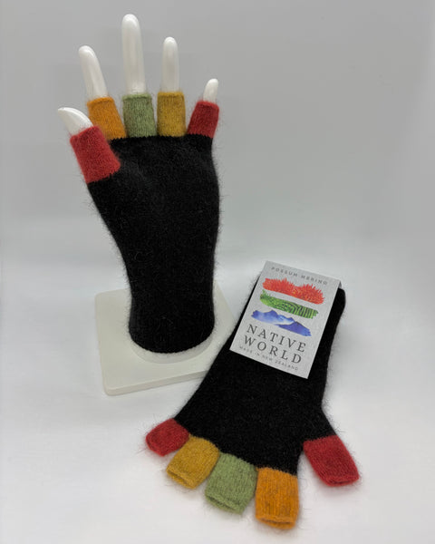 Black gloves with multicoloured half fingers on a white mannequin hand with a ‘Native World’ brand tag.