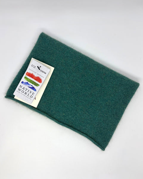 Teal neck warmer with a ‘Native World’ tag on a white background