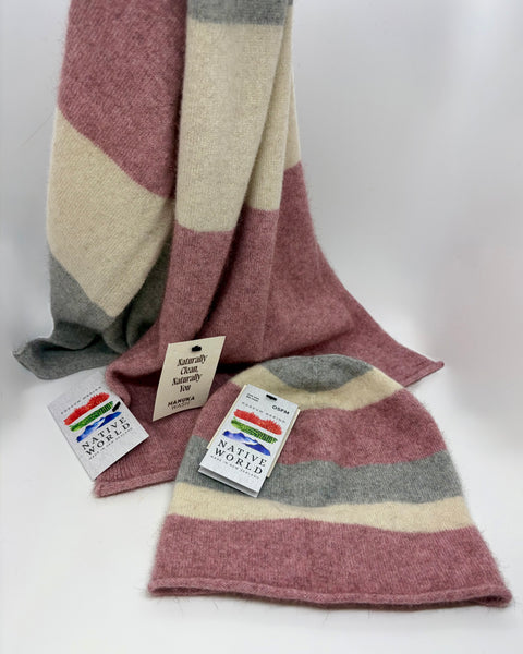 Pink and grey striped beanie and scarf set with 'Native World' tags on a white background.