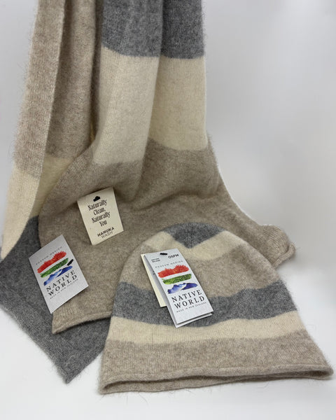 Beige and grey striped beanie and scarf set with 'Native World' tags on a white background
