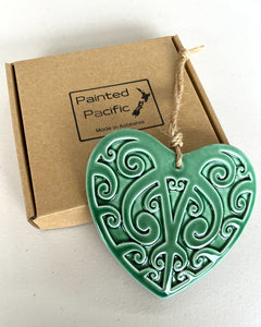 Ceramic Green Heart decoration in a gift box with Maori Kowhaiwhai design and twine loop for hanging. Made in Aotearoa New Zealand by Painted Pacific Pottery.