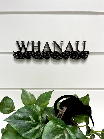 Made in NZ indoor wall sign Whanau (family) in black balsa wood.