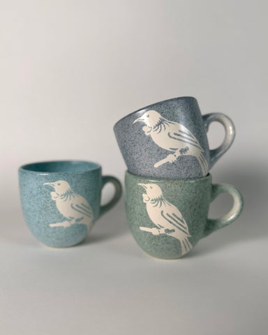 https://www.thefantailhouse.co.nz/cdn/shop/files/bird_mugs_TheFantailHouse_Painted_Pacific_Pottery_large.jpg?v=1683774439