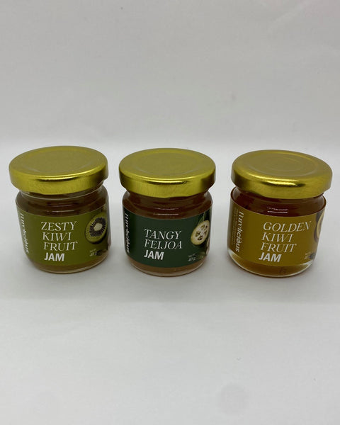 Three jars of jam that are Kiwifruit, Feijoa and Golden Kiwifruit flavours.